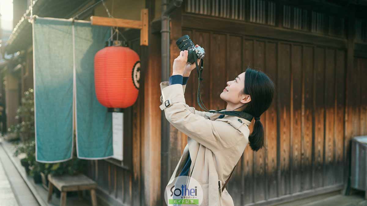 街の風景を撮るカメラマン吉住明子